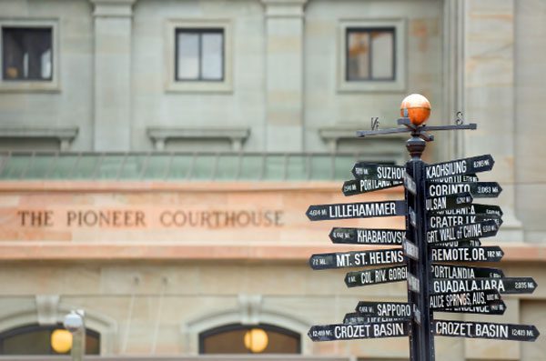 A sign in front of The Pioneer Courthouse